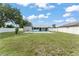 View of the fenced backyard with a pool at 3232 Butterfield St, Deltona, FL 32738