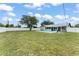 The backyard has a pool and fenced yard at 3232 Butterfield St, Deltona, FL 32738