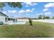Backyard with a pool, perfect for outdoor entertaining at 3232 Butterfield St, Deltona, FL 32738
