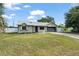 A single-Gathering home with two car garage and landscaped yard at 3232 Butterfield St, Deltona, FL 32738