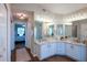 This light and bright bathroom has dual sinks and lots of storage at 32937 Scenic Hills Dr, Mount Dora, FL 32757