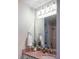 Bright bathroom featuring vanity with granite countertop and modern lighting at 32937 Scenic Hills Dr, Mount Dora, FL 32757