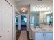 Hallway leads from the bathroom to the bedroom at 32937 Scenic Hills Dr, Mount Dora, FL 32757