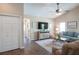Open living room featuring wood floors and transitional decor at 32937 Scenic Hills Dr, Mount Dora, FL 32757