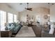 Bright and airy living room with vaulted ceilings, modern furnishings, and seamless open-concept design at 32937 Scenic Hills Dr, Mount Dora, FL 32757