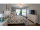 The main bedroom overlooks the pool and has lots of natural light at 32937 Scenic Hills Dr, Mount Dora, FL 32757
