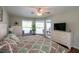 Large, bright main bedroom has a view of the swimming pool at 32937 Scenic Hills Dr, Mount Dora, FL 32757