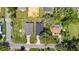 Bird's-eye view of a property highlighting its roof, landscaping, and surrounding neighborhood at 3672 Rollin O Ln, Apopka, FL 32703