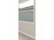 This shot shows a light bedroom wall, trim and frosted window at 3672 Rollin O Ln, Apopka, FL 32703
