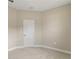 A clean bedroom features plush carpet, neutral walls and white trim and door at 3672 Rollin O Ln, Apopka, FL 32703