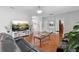 Spacious living room boasts hardwood floors, modern furnishings, and abundant natural light at 3813 Blue Dasher Dr, Kissimmee, FL 34744