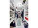 Organized walk-in closet with shelves, drawers, and ample storage space for clothes and accessories at 3813 Blue Dasher Dr, Kissimmee, FL 34744