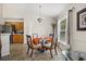 Cozy dining area featuring wood-look floors and lots of natural light at 4110 Boca Woods Dr, Orlando, FL 32826