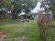 Spacious backyard with green grass and patio space at 4123 Gander Ave, Orlando, FL 32822