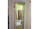 Hallway view of bathroom with tiled floors and shower at 4123 Gander Ave, Orlando, FL 32822