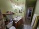 Bathroom featuring tiled floor, vanity, toilet, and shower at 4123 Gander Ave, Orlando, FL 32822