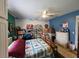 Spacious bedroom with unique decor and ceiling fan at 4123 Gander Ave, Orlando, FL 32822