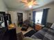 Comfortable bedroom with ceiling fan and ample closet space at 4123 Gander Ave, Orlando, FL 32822