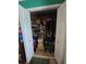Walk in closet with wooden shelving for ample storage at 4123 Gander Ave, Orlando, FL 32822