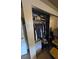 Bedroom closet with mirrored doors and built in storage at 4123 Gander Ave, Orlando, FL 32822
