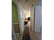 Hallway view leads into open living space with natural light at 4123 Gander Ave, Orlando, FL 32822
