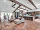 Open-concept living space with kitchen island, dining area, and a cozy living room setup at 4454 Aspenwood Ct, Orlando, FL 32835