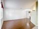 Spacious living room with hardwood floors, bright walls, and ample natural light at 451 Acacia Tree Way, Kissimmee, FL 34758