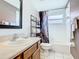 Clean bathroom featuring a shower and tub combination and a single vanity at 512 Viola Dr, Davenport, FL 33837