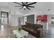 Open-concept living room featuring modern finishes and access to kitchen at 545 Hardwood Cir, Orlando, FL 32828