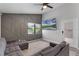 Cozy living room features decorative wall and view to the backyard at 545 Hardwood Cir, Orlando, FL 32828