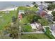 Aerial view of the property showcasing its backyard, additional garage, parking and proximity to other homes at 5529 Hansel Ave, Orlando, FL 32809