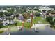 Waterfront property featuring a private beach, lush greenery, and a lake view, outlined in red at 5529 Hansel Ave, Orlando, FL 32809