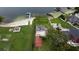 Aerial view showcasing the property's lakefront location and proximity to the water at 5529 Hansel Ave, Orlando, FL 32809