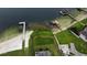 Aerial view showcasing the property's lakefront location and proximity to the water and docks at 5529 Hansel Ave, Orlando, FL 32809
