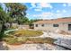 Spacious backyard with mature trees, providing a private and serene outdoor oasis at 5812 Viking Rd, Orlando, FL 32808