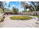 Lush backyard with mature trees, offering a private and serene outdoor space for relaxing at 5812 Viking Rd, Orlando, FL 32808