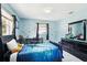 bedroom with cute sea animal themed decor, including a desk, dresser, and comfortable bed at 6663 Nw 60Th St, Ocala, FL 34482
