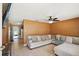 Comfortable living room with tile floors, neutral paint, and a large sectional sofa for relaxing at 6663 Nw 60Th St, Ocala, FL 34482