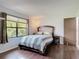 Bedroom featuring a modern bed frame and lots of natural light at 700 E Mattie St, Sanford, FL 32773