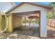 Exterior view of a covered carport with open access to a backyard at 700 E Mattie St, Sanford, FL 32773