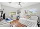 Bright bedroom with hardwood floors, ample natural light, and plenty of space at 725 S Hampton Ave, Orlando, FL 32803