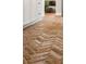 Unique brick flooring in herringbone pattern complements the kitchen's bright and airy design at 725 S Hampton Ave, Orlando, FL 32803
