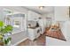 Bright kitchen with brick floors, white cabinets, wood countertops, and stainless steel appliances at 725 S Hampton Ave, Orlando, FL 32803