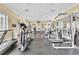 Well-equipped gym featuring a variety of modern exercise machines for a complete workout at 730 Siena Palm Dr # 201, Celebration, FL 34747