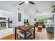 Open-concept eat in space adjacent to living room and kitchen at 7806 Compass Dr, Orlando, FL 32810