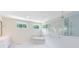 Bright bathroom features a tub, stand-up shower, and sleek finishes at 8480 Adalina Pl, Orlando, FL 32827