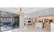 Open concept living room with a direct view to an outdoor patio at 8480 Adalina Pl, Orlando, FL 32827