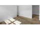 Bright living room featuring new wood flooring and freshly painted walls; naturally lit by sunlight at 906 Kensington Dr, Orlando, FL 32808