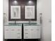Bathroom featuring a dual vanity with modern finishes and fixtures at 9138 Great Heron Cir, Orlando, FL 32836