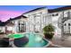 Luxury home showcasing pool, spa, and architectural lighting at 9138 Great Heron Cir, Orlando, FL 32836